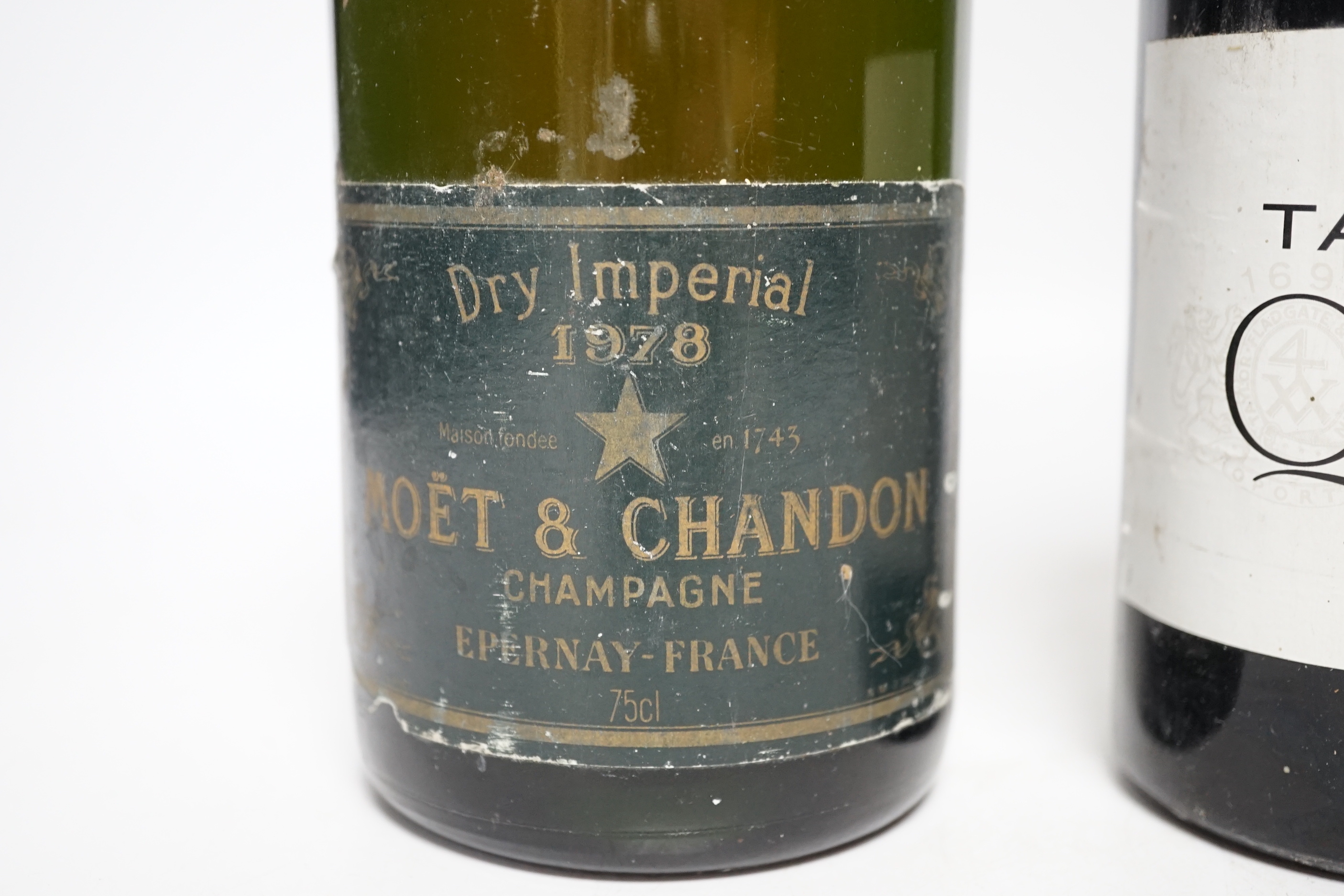 A bottle of Moët & Chandon 1978 Dry Imperial Champagne, a bottle of Croft 1982 Vintage Port and a Taylor’s 1986 Vintage Port (3)